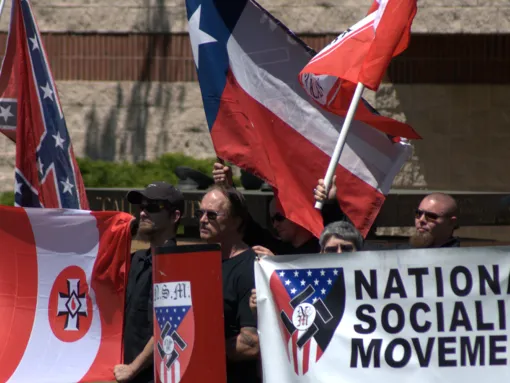 Group of people holding flags